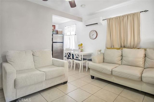 tiled living room featuring a wall unit AC and ceiling fan