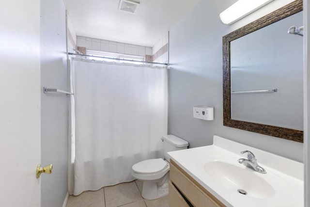 full bathroom with vanity, shower / bath combo with shower curtain, toilet, and tile patterned floors