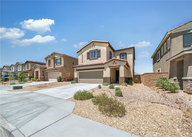 mediterranean / spanish-style home featuring a garage