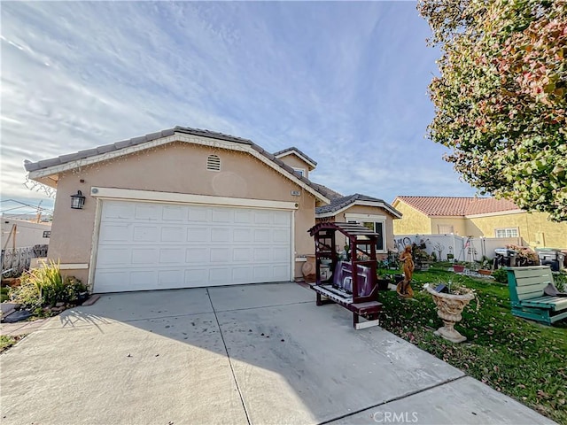 view of front of home featuring a garage