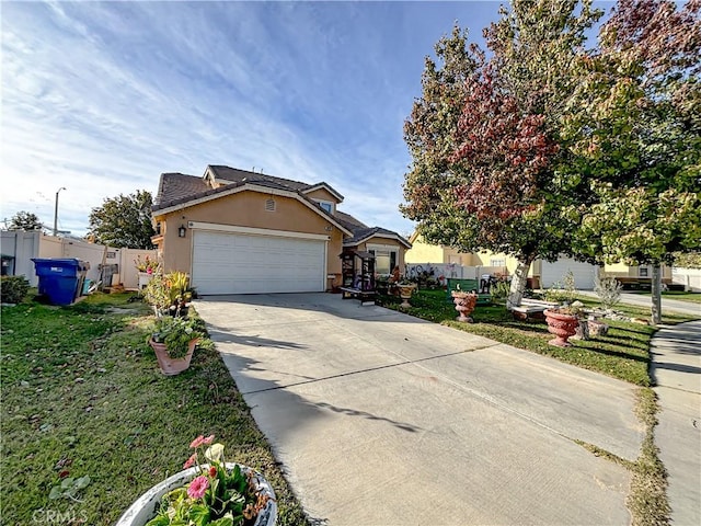 view of front of house with a garage and a front yard