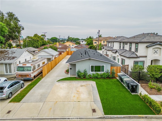 view of front of home with a front lawn