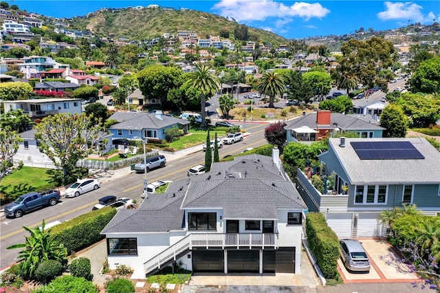 drone / aerial view featuring a mountain view