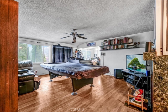 rec room featuring ceiling fan, hardwood / wood-style flooring, a textured ceiling, and pool table