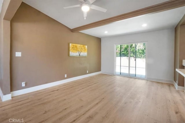 empty room featuring beam ceiling, ceiling fan, and light hardwood / wood-style flooring