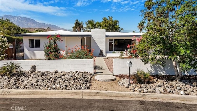 ranch-style house with a mountain view