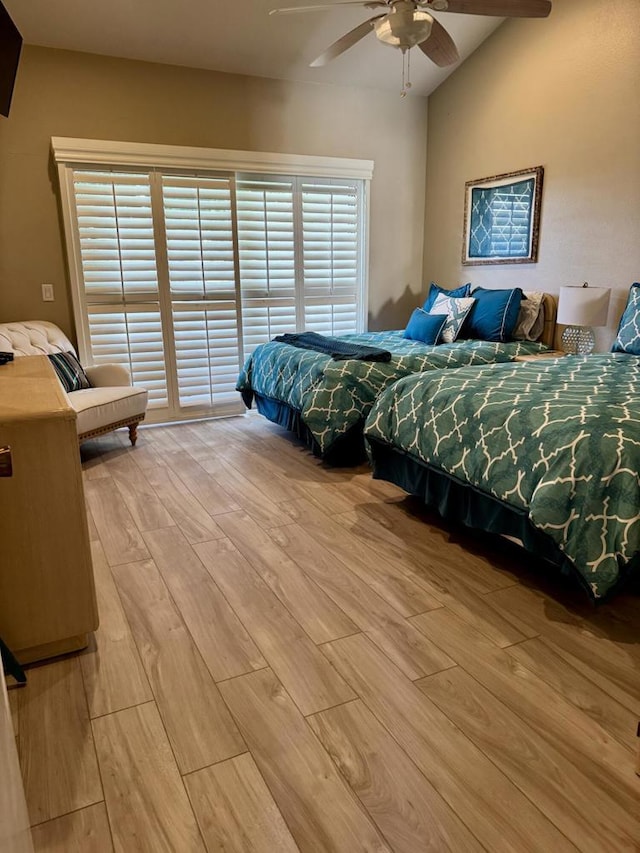 bedroom featuring ceiling fan and light wood-type flooring