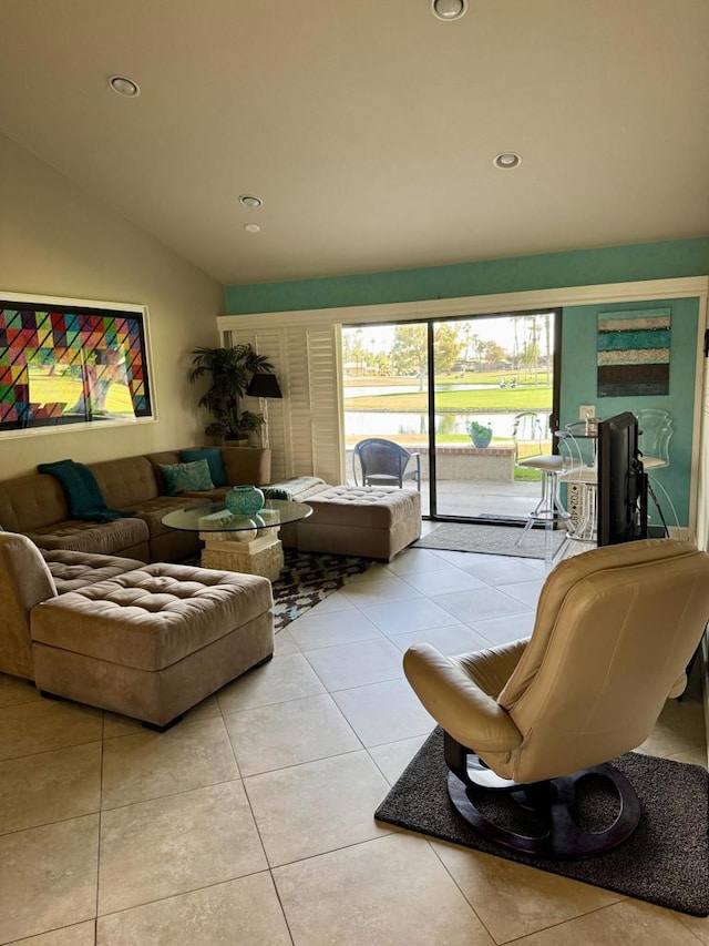 tiled living room with vaulted ceiling