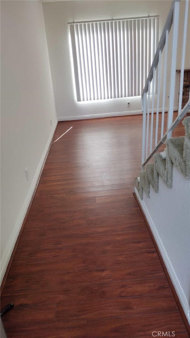 interior space with dark hardwood / wood-style flooring