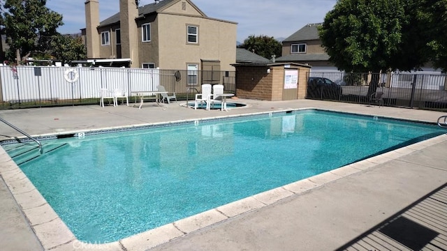 view of pool with a patio area