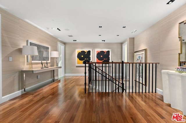 corridor featuring hardwood / wood-style flooring