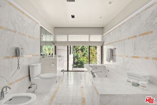 bathroom featuring a healthy amount of sunlight, tiled bath, toilet, and tile walls