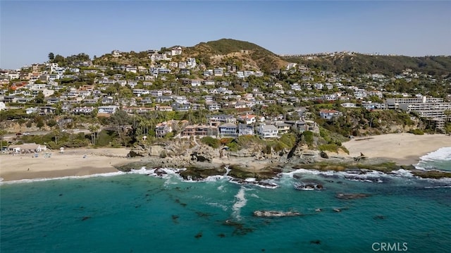 bird's eye view with a water and mountain view and a beach view