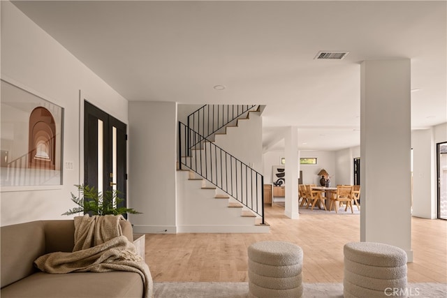 entrance foyer featuring light hardwood / wood-style floors