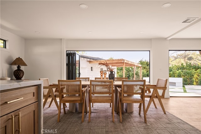 dining room featuring wood-type flooring