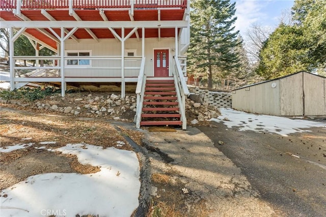 exterior space with a shed