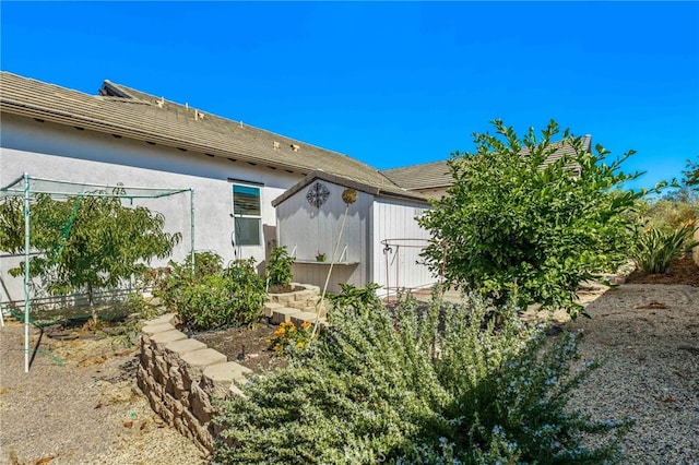 view of home's exterior with stucco siding