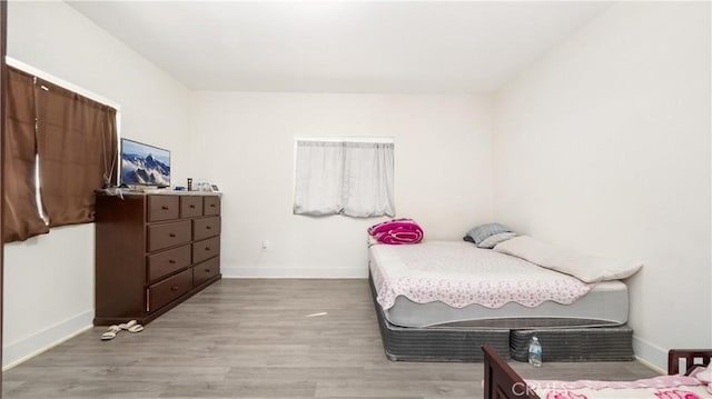 bedroom featuring light hardwood / wood-style flooring