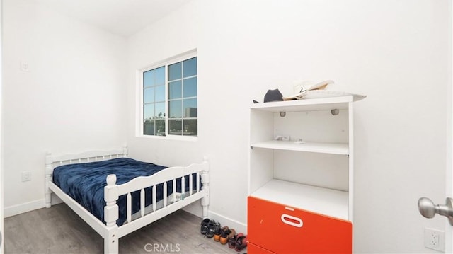 bedroom featuring hardwood / wood-style floors