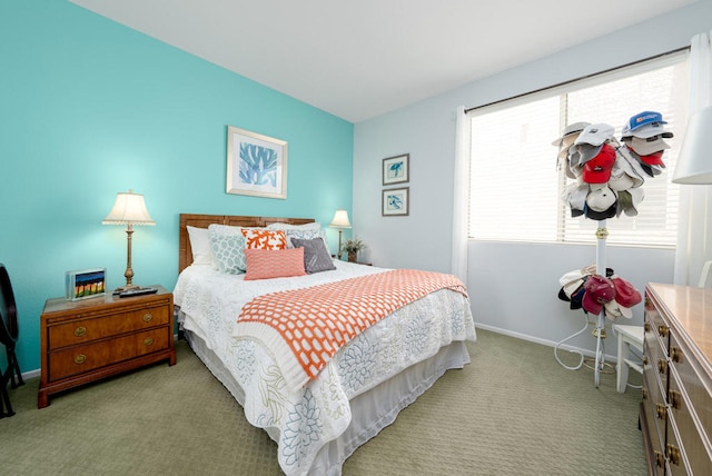 bedroom featuring light colored carpet