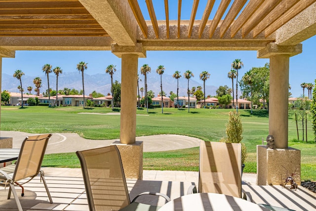 view of patio / terrace featuring a mountain view and a pergola