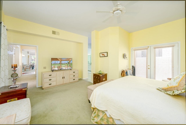 bedroom with light carpet, access to exterior, and ceiling fan