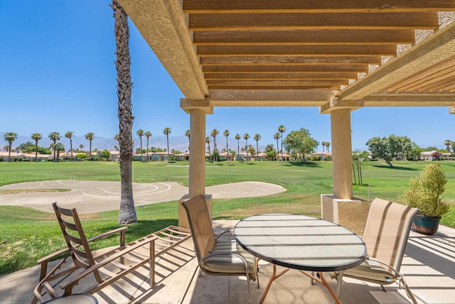 view of patio featuring basketball hoop