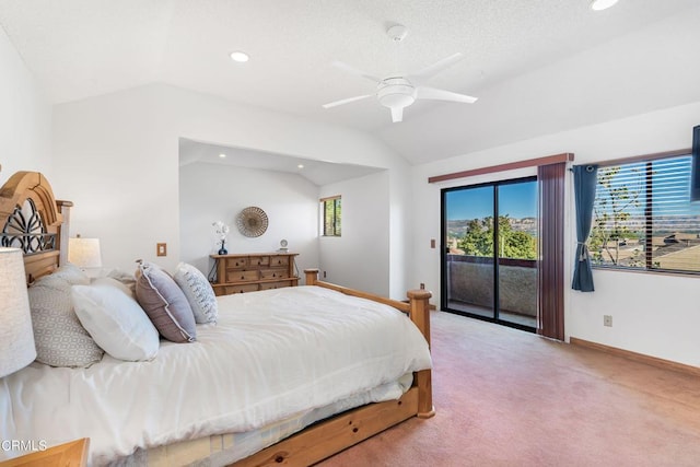 bedroom with access to exterior, multiple windows, lofted ceiling, and ceiling fan