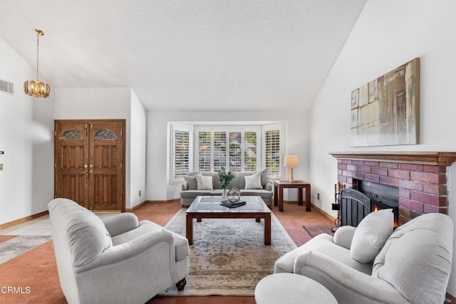 living room featuring a chandelier, a brick fireplace, high vaulted ceiling, and light tile patterned flooring