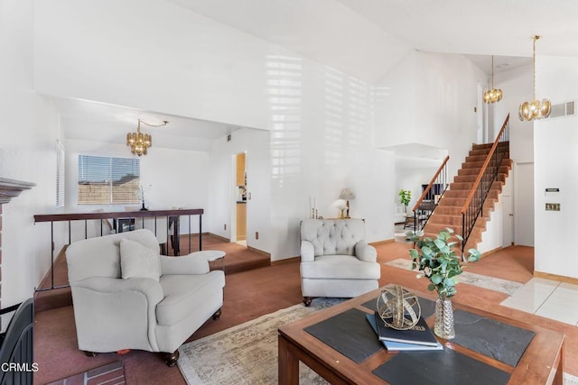 living room with high vaulted ceiling and an inviting chandelier