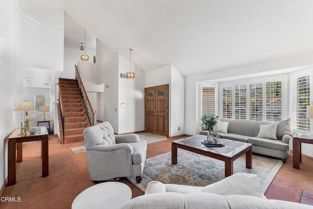 living room featuring light colored carpet, high vaulted ceiling, and a healthy amount of sunlight