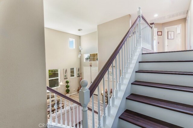 stairway with wood-type flooring