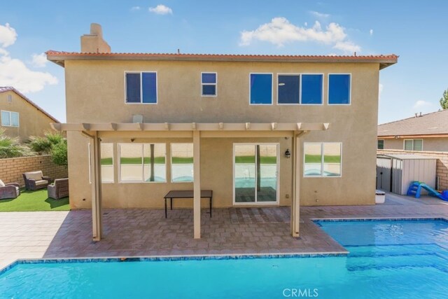 back of house featuring a patio