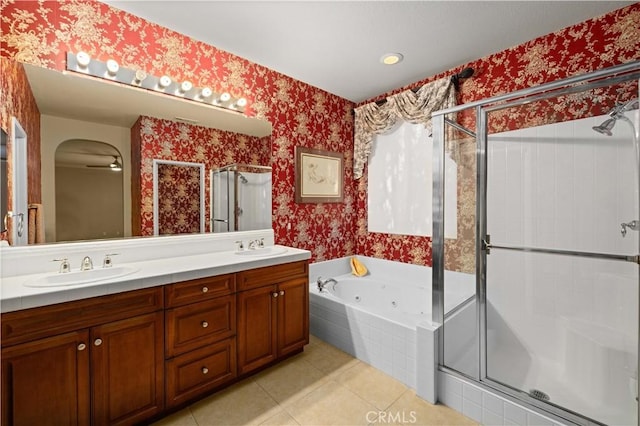 bathroom featuring tile patterned floors, vanity, and independent shower and bath