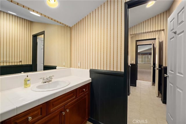 bathroom with vanity and tile patterned floors