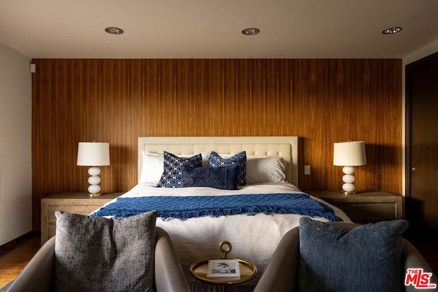 bedroom featuring wood-type flooring