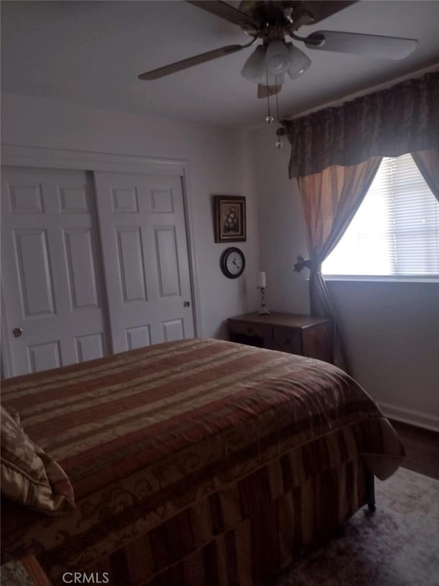 bedroom featuring a closet and ceiling fan