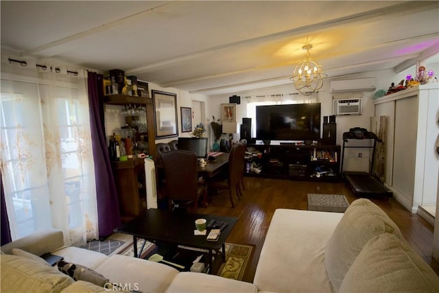 living room with beamed ceiling, dark hardwood / wood-style flooring, a wall mounted air conditioner, and an inviting chandelier