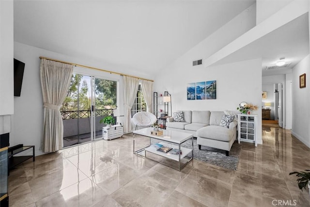 living room with lofted ceiling