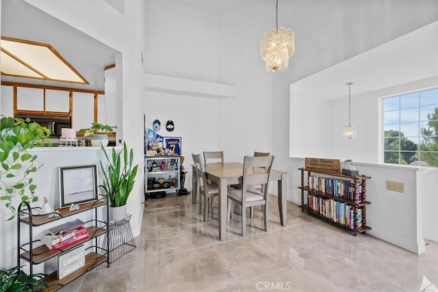 dining space featuring a chandelier