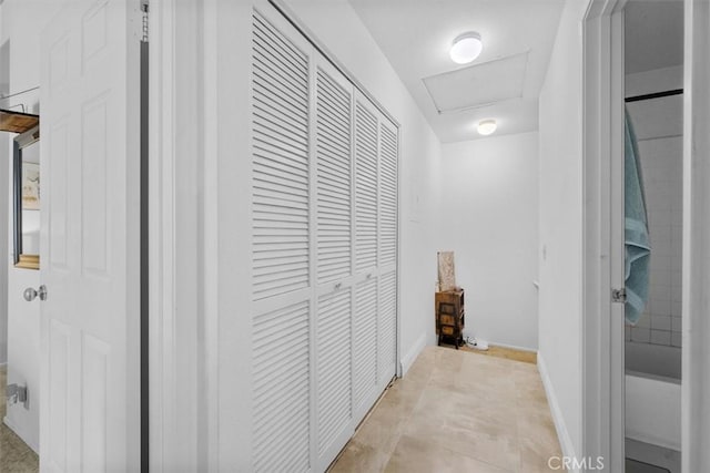 hallway with light tile patterned flooring