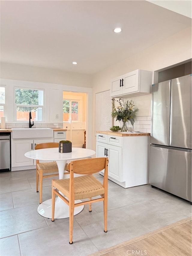 dining room featuring recessed lighting