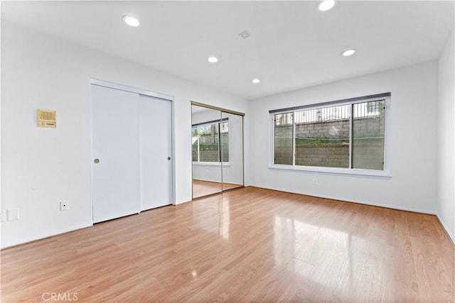 17931 Calle, Los Arboles, Rowland Heights, CA 91748 - unfurnished bedroom with baseboards, recessed lighting, two closets, and wood finished floors