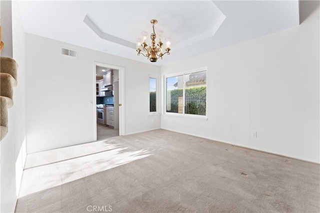 17931 Calle, Los Arboles, Rowland Heights, CA 91748 - spare room featuring a raised ceiling, carpet flooring, a notable chandelier, and visible vents