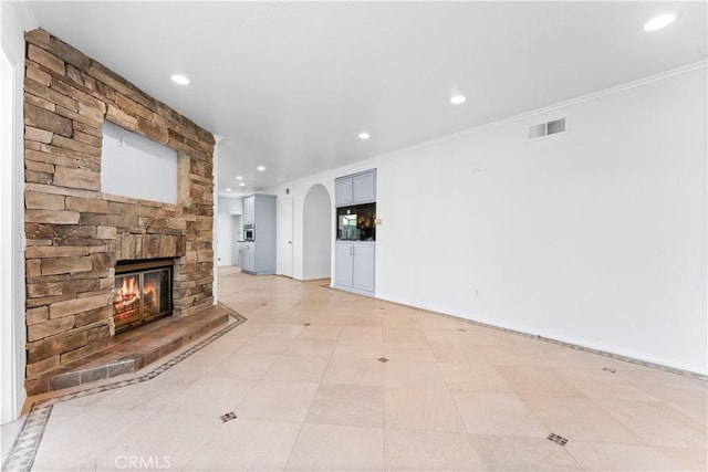 17931 Calle, Los Arboles, Rowland Heights, CA 91748 - unfurnished living room featuring crown molding, a stone fireplace, visible vents, and recessed lighting