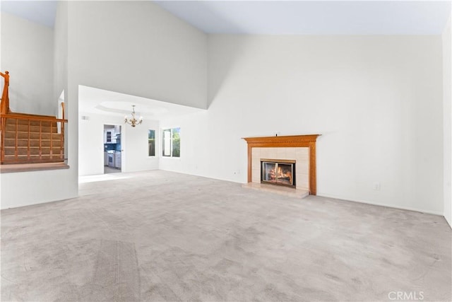 17931 Calle, Los Arboles, Rowland Heights, CA 91748 - unfurnished living room featuring carpet, stairway, a chandelier, and a tile fireplace
