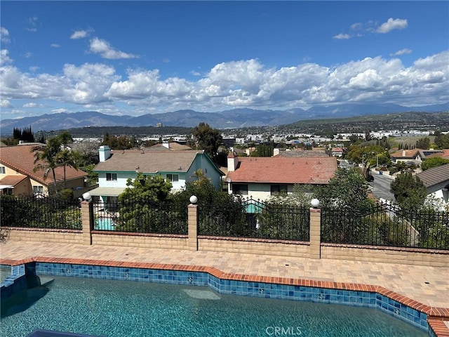 17931 Calle, Los Arboles, Rowland Heights, CA 91748 - view of pool with a residential view, a mountain view, a fenced in pool, and fence