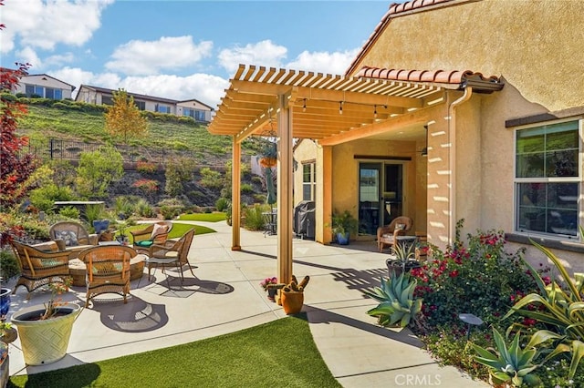 view of patio / terrace featuring a pergola