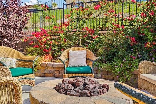 balcony with a patio area and a fire pit