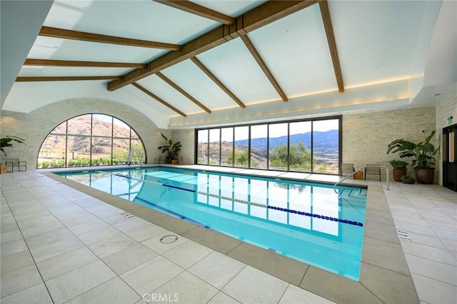 view of swimming pool featuring a mountain view